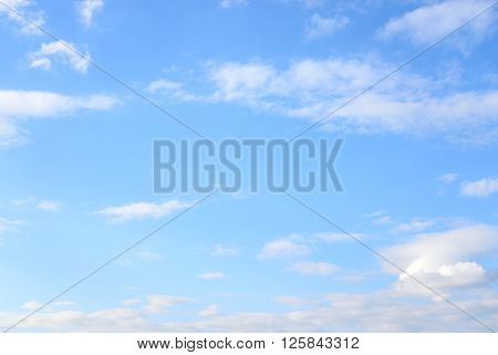 Blue sky with spindrift clouds may be used as background.