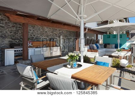 beautiful terrace of a luxury house; dining table