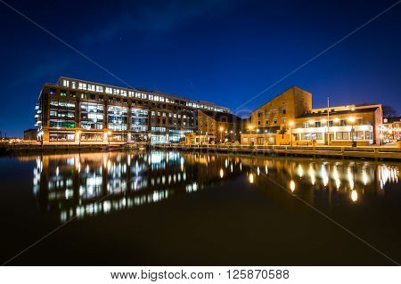 Buildings On The Waterfront In Fells Point At Night, In Baltimore, Maryland.