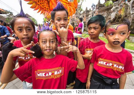 UBUD, BALI - MAR 8, 2016: Unidentified children during the celebration before Nyepi - Balinese Day of Silence. Day Nyepi is also celebrated as New Year - according Balinese calendar now came 1938 year