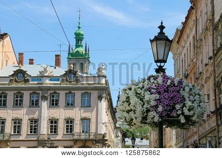 Lviv Ukraine - July 5 2014: Streets in the Old Town. View to Korniakt tower