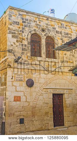 JERUSALEM ISRAEL - FEBRUARY 16 2016: The Franciscan Church of Simon the Cyrenian is the fifth station on Via Dolorosa street the way of Jesus and pilgrims' route on February 16 in Jerusalem.
