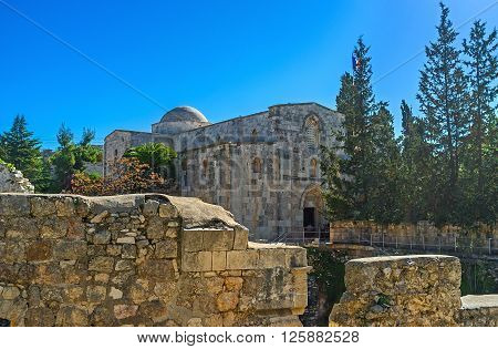 The ruined Byzantine Basilica stands on the earlier Pagan Roman Temple and adjacent to the St Anne's Church in Via Dolorosa Jerusalem Israel.