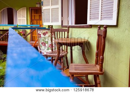 Brazil traditional house. table and chairs on the terrac. Brasil