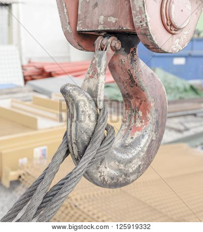 A close up of the hook on a crane.