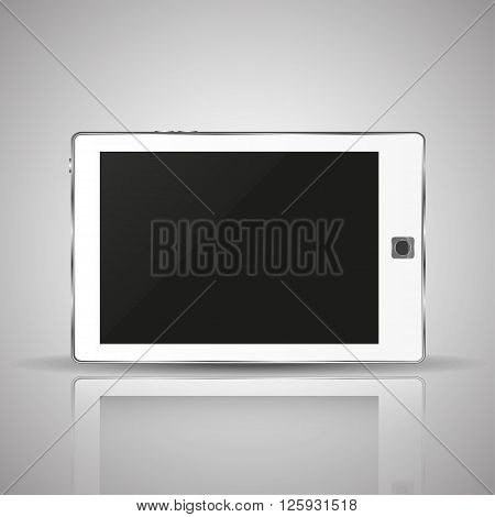 White tablet in a horizontal position with shadow and reflection