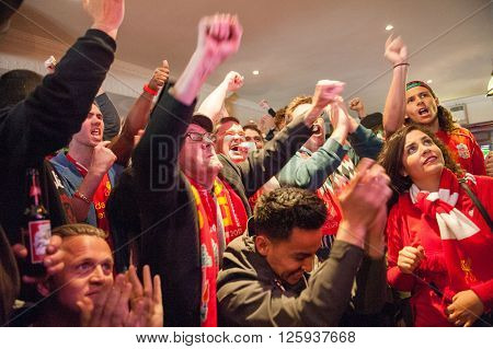 LIVERPOOL, UK - MAY 11th 2014: Liverpool Football Club supporters outside Anfield for the final title race match of the season against Newcastle