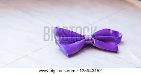 Purple bow tie. Wedding accessories for a groom