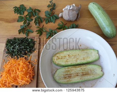 Squash oyster mushrooms goutweed puff with carrot, cooking with wild plants, with greenary