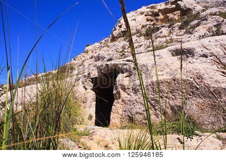 View of the Necropolis of Realmese. Necropoli Pantalicana is an achaeological park in Calascibetta Sicily