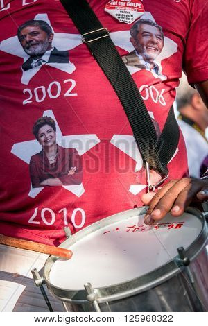 Brasilia, Brazil April 16th 2016 A pro President Dilma Rousseff supporter beating a drum in her support