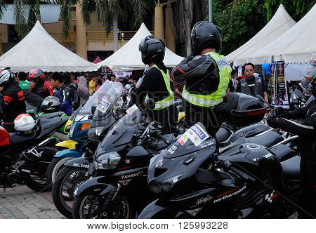 KELANTAN, MALAYSIA -JULY 07, 2012: A number of super bike motorcycle parked in rows in the open area and have been exhibited to the public.