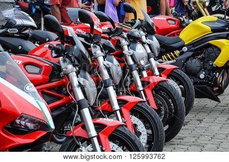 KELANTAN, MALAYSIA -JULY 07, 2012: A number of super bike motorcycle parked in rows in the open area and have been exhibited to the public.