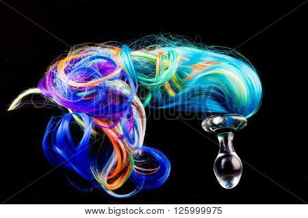 miny pony anal plug in black background