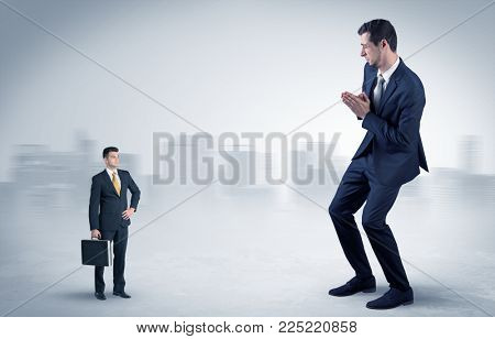 Giant businessman being afraid of small serious executor with suitcase