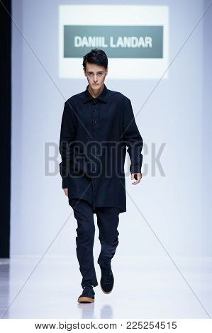 MOSCOW, RUSSIA - MARCH 26, 2017: Model walk runway for DANIIL LANDAR catwalk at Autumn-Winter 2017-2018 Moscow Fashion Week. Men's fashion