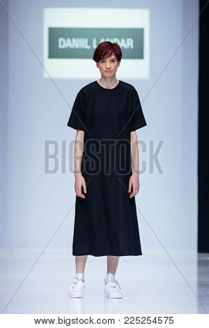 MOSCOW, RUSSIA - MARCH 26, 2017: Model walk runway for DANIIL LANDAR catwalk at Autumn-Winter 2017-2018 Moscow Fashion Week.