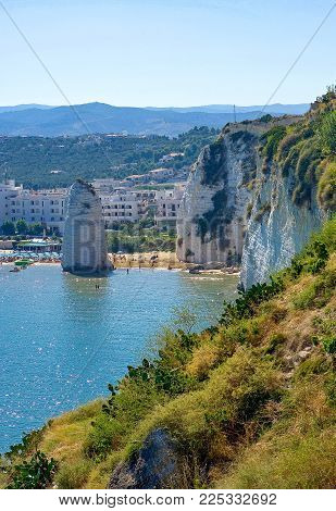 Vieste, Italy - Septembe 5, 2006: View of the Pizzomunno monolith on the beach of the village