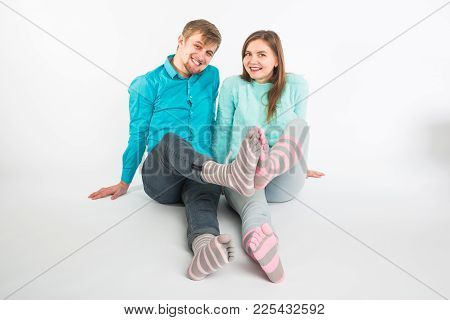 Portrait Funny Moments Of Excited Couple Fooling Around To Camera On White Background. Having Fun, W