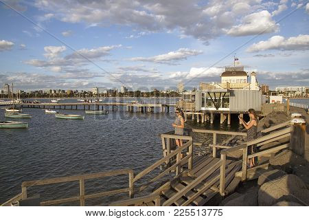 St Kilda, Australia: March, 2017: St Kilda Pier With The Iconic Little Blue Pavilion. The Breakwater