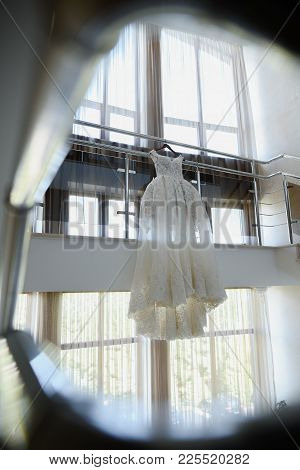 Wedding White Bride Dress On The Background Of A Large Window