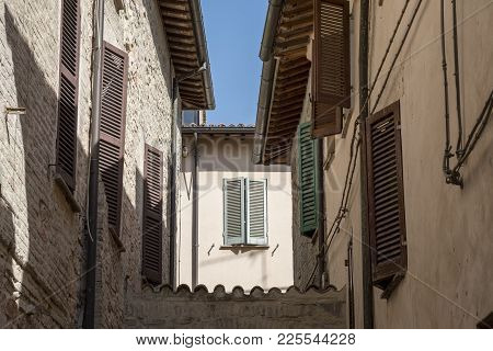 Historic Buildings Of Foligno, Perugia, Umbria, Italy. Old Typical Street In The Medieval Quarter