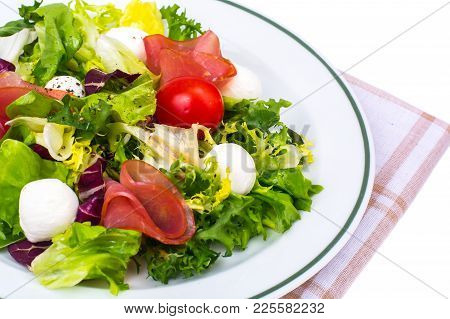 Italian Salad With Parma Ham And Mozzarella. Studio Photo