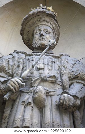 A Statue Of King Henry Viii Located Above The Henry Viii Gate At St. Bartholomews Hospital In The Ci