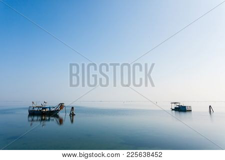 Fishing Boats Inside Po River Lagoon, Italy. Italian Landscape. Minimal Water Panorama