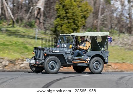 Adelaide, Australia - September 25, 2016: Vintage 1943 Willys Gpw Tourer Driving On Country Roads Ne