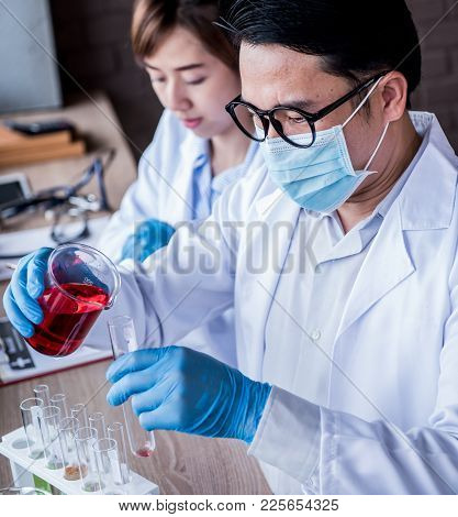 Scientist Working In Science And Chemical For Health. Doctor Working In Lap Test.