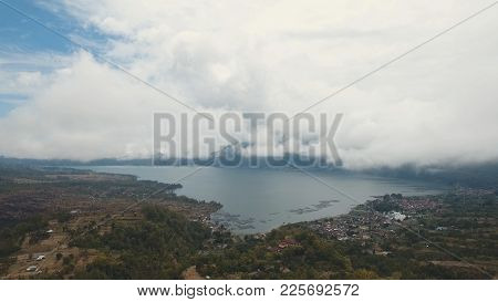 Lake Batur In The Crater Of A Volcano. Aerial View Of Volcano Mount And Lake Batur Located In Kintam