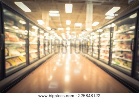 Blurred Frozen And Prepared Food Aisle At Retail Store In America