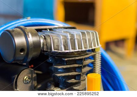 Cylinder And Head Of Air Compressor With Air Cooling Fins.