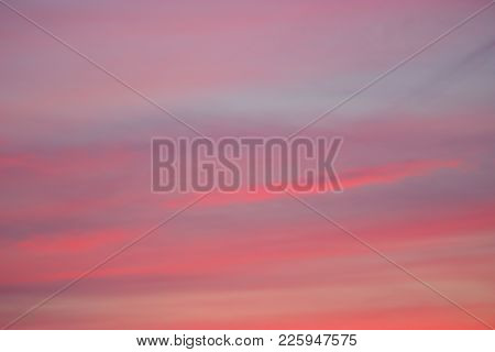 Pink Clouds In Blue Sky