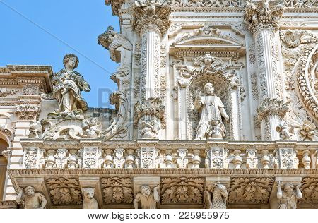 Lecce, Italy , Detail Of The Full Of Sculpture Facade Of The Santa Croce Basilica