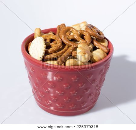 Salty Snack In A Red Cup Composition In A White Background