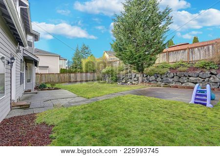 Backyard View With Natural Stone Lanscape Design