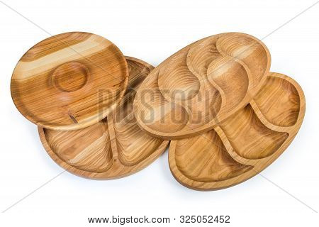 Different Empty Compartmental Dishes And Serving Boards Round And Oval Shapes Made With Hardwood On 