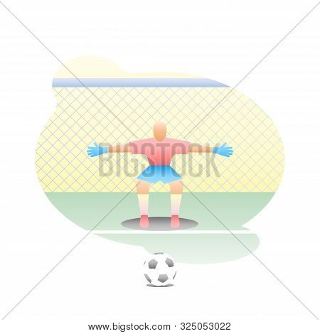 Football Goalkeeper Stands At The Goal With A Net In A Half-sitting Position With His Arms Apart To 