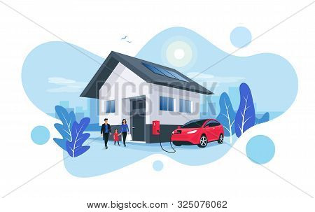 Electric Car Parking Charging At Home Wall Box Charger Station On House With A Family. Renewable Ene