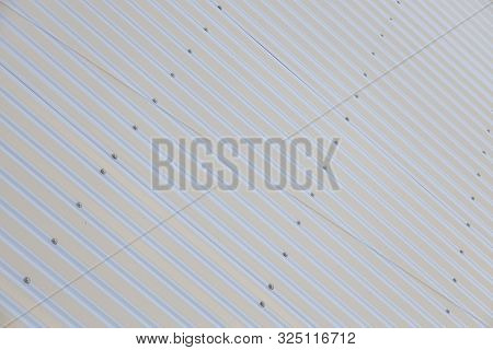Angular View Of Metal Shiny Black Striped Surface