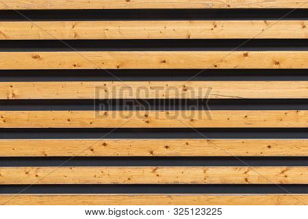 Light Wooden Planks With Dark Gaps On The Wall