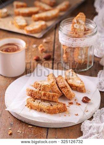 Traditional Catalan Biscotti Carquinyolis, Cookies Or Cantuccini, With Almonds Nuts And Coffee. Wood