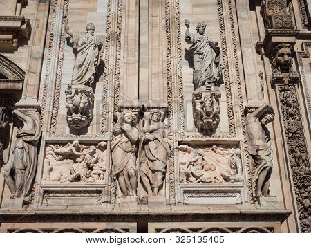 Ornate Facade Of Milan Catehdral In Italy