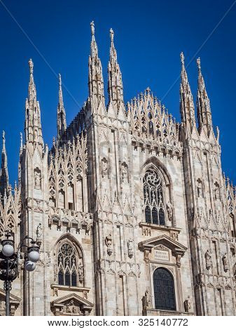 Ornate Facade Of Milan Catehdral In Italy