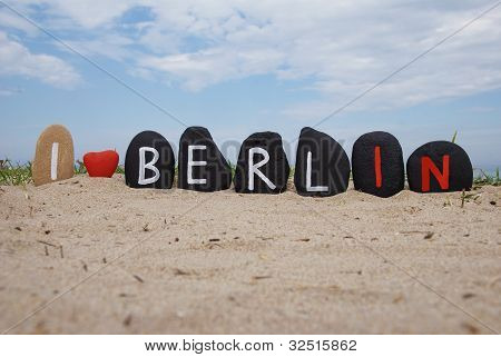 I love Berlin, stones composition on the sand