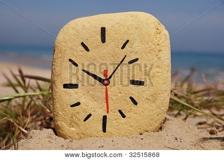stone clock, game on the beach