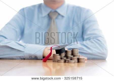 A Businessman Saveing Coins For Eudcation University