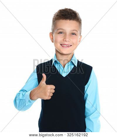 Happy Boy In School Uniform On White Background